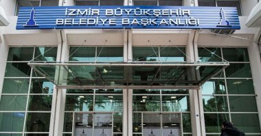 A sign of the Izmir Metropolitan Municipality building, Izmir, western Türkiye. (DHA Photo)
