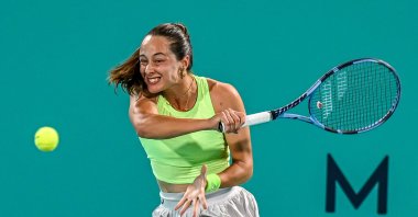Türkiye's Zeynep Sönmez in action during the Abu Dhabi Open match against the Philippines' Alexandra Eala at the Zayed Sports City’s International Tennis Center, Feb. 3, 2026. (AA Photo)