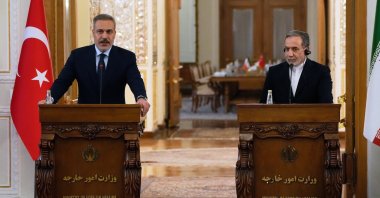 Foreign Minister Hakan Fidan speaks in a joint news briefing with his Iranian counterpart Abbas Araghchi (R) after their meeting, Tehran, Iran, Nov. 30, 2025. (AP Photo)