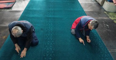 Workers prepare handwoven carpets for the Tokyo Mosque, Manisa, western Türkiye, Jan. 29, 2026. (AA Photo)