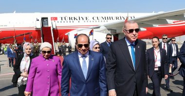 President Recep Tayyip Erdoğan and Egyptian President Abdel-Fattah el-Sissi (R) walk at the airport after a welcoming ceremony, Cairo, Egypt, Feb. 4, 2026. (DHA Photo)