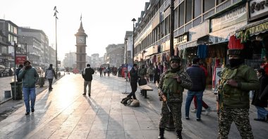 Indian paramilitary troopers stand guard along a road, Srinagar, the summer capital of India-occupied Kashmir, Jan. 14, 2026. (AFP Photo)