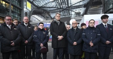 Railway workers commemorate conductor Serkan C. at the Berlin Hauptbahnhof, Feb. 4, 2026. (AA Photo)