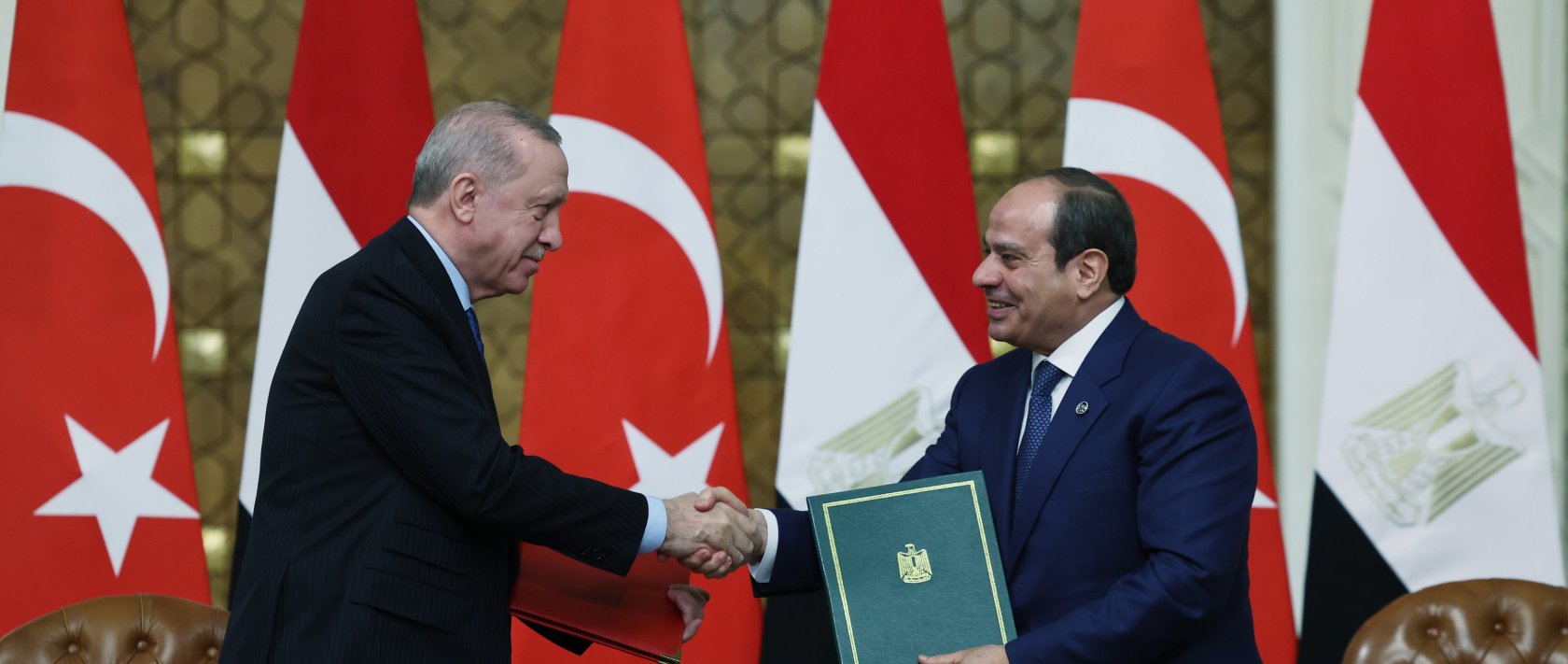 President Recep Tayyip Erdoğan and Egyptian President Abdel Fattah el-Sissi shake hands after signing bilateral agreements in Cairo, Feb. 4, 2026. (AA Photo)