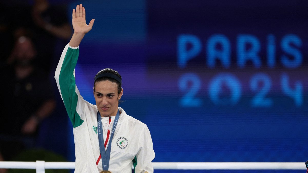 Gold medallist Imane Khelif of Algeria waves with her Paris 2024 Olympics gold medal at the Roland-Garros Stadium, Paris, France, Aug. 9, 2024. (Reuters Photo)