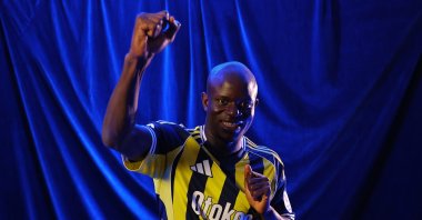 N'Golo Kante poses for a photo after signing as a new Fenerbahçe player, Istanbul, Türkiye, Feb. 4, 2026. (DHA Photo)