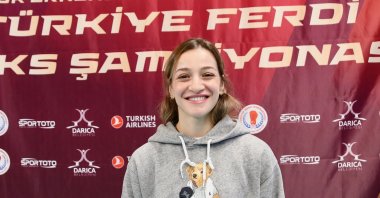 World and European champion Buse Naz Çakıroğlu poses in the ring as she sets her sights on LA 2028, aiming to turn her Olympic silver into gold and complete her medal collection, Kocaeli, Türkiye, Feb. 1, 2026. (AA Photo)