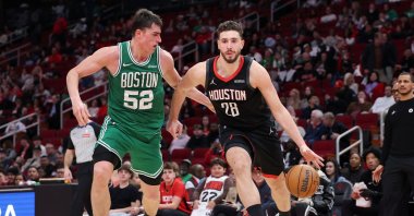 Boston Celtics' Luka Garza (L) defends Houston Rockets' Alperen Şengün in the second half at Toyota Center, Houston, U.S., Feb. 4, 2026. (AFP Photo)