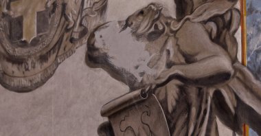 An apparent likeness of Italian Prime Minister Giorgia Meloni on an angel fresco painting is covered, after sparking political and clerical controversy, inside the Basilica of St. Lawrence in Lucina, Rome, Italy, Feb. 4, 2026. (Reuters Photo)