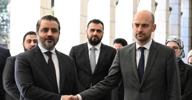 Syrian Minister of Foreign Affairs and Expatriates Asaad Al-Shaibani shakes hands with French Foreign Minister Jean-Noel Barrot at the Tishreen Presidential Palace in the Syrian capital Damascus, Feb. 5, 2026. (AFP Photo)