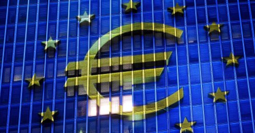A projection of a euro currency sign is pictured on the facade of the European Central Bank (ECB) headquarters, Frankfurt, Germany, Dec. 30, 2025. (AFP Photo)