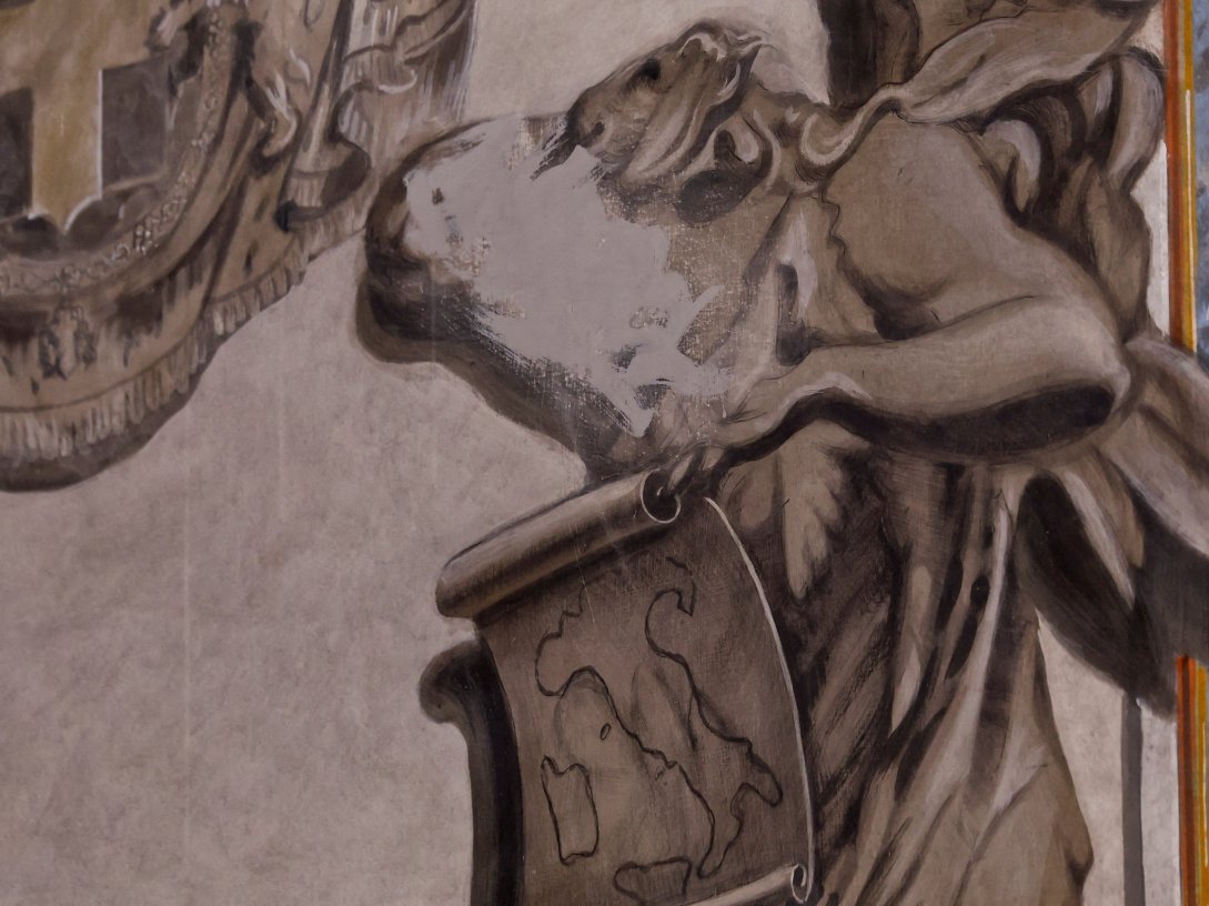 An apparent likeness of Italian Prime Minister Giorgia Meloni on an angel fresco painting is covered, after sparking political and clerical controversy, inside the Basilica of St. Lawrence in Lucina, Rome, Italy, Feb. 4, 2026. (Reuters Photo)