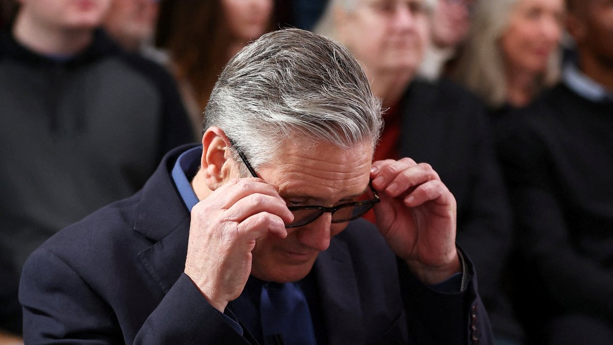 British Prime Minister Keir Starmer adjusts his glasses as he waits to deliver his speech at Horntye Park Sports Complex, St. Leonards, U.K., Feb. 5, 2026. (Reuters Photo)