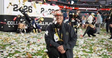 Noah Winter, responsible for the confetti displays, poses for a picture after the College Football Playoff national championship game in Miami Gardens, Florida, U.S., Jan. 19, 2026. (AP Photo