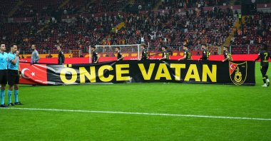 Galatasaray and Istanbulspor players hold a banner reading “Önce Vatan” (Country First) during a moment of remembrance ahead of their Ziraat Türkiye Kupası Group A third-round match at RAMS Park, Istanbul, Türkiye, Feb. 4, 2026. (IHA Photo)