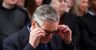 British Prime Minister Keir Starmer adjusts his glasses as he waits to deliver his speech at Horntye Park Sports Complex, St. Leonards, U.K., Feb. 5, 2026. (Reuters Photo)