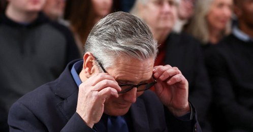 British Prime Minister Keir Starmer adjusts his glasses as he waits to deliver his speech at Horntye Park Sports Complex, St. Leonards, U.K., Feb. 5, 2026. (Reuters Photo)