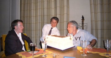Peter Mandelson sits with late financier and convicted sex offender Jeffrey Epstein, as he blows out the candles on a cake, in an undated photograph released by the Department of Justice as part of a trove of documents from its investigations into Epstein, in Washington, D.C., U.S., Dec. 19, 2025. (Reuters Photo)