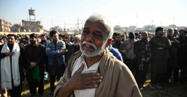 A mourner weeps during the funeral of Shiite Muslims, a day after a suicide bombing at a mosque in Islamabad, Pakistan, Feb. 7, 2026. (AFP Photo)