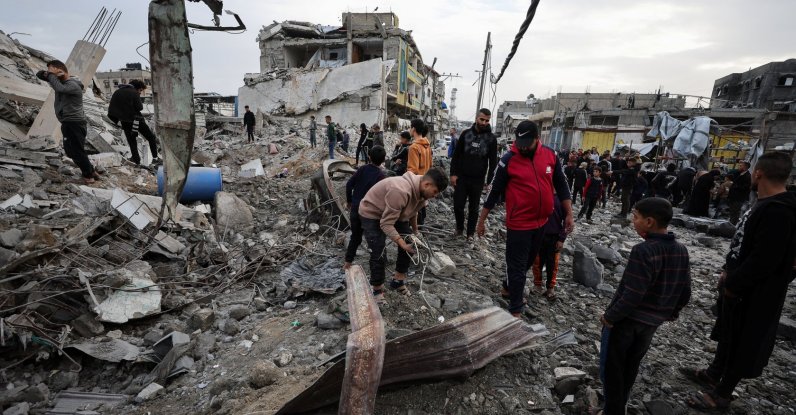 Palestinians inspect a building hit by an Israeli strike, in Gaza City, Feb. 6, 2026. (Reuters Photo)