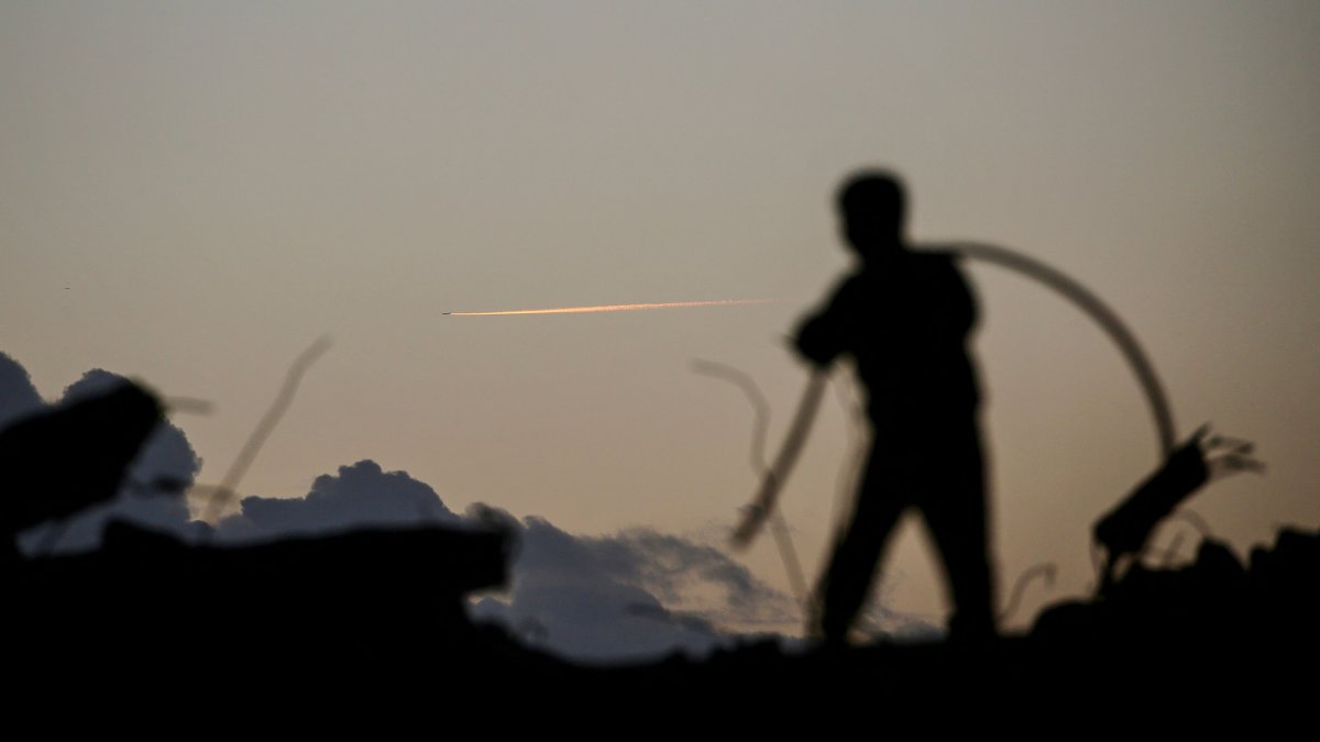 A person is silhouetted while standing on the rubble in the Bureij refugee camp in the central Gaza Strip, Palestine, Feb. 3, 2026. (AFP Photo)