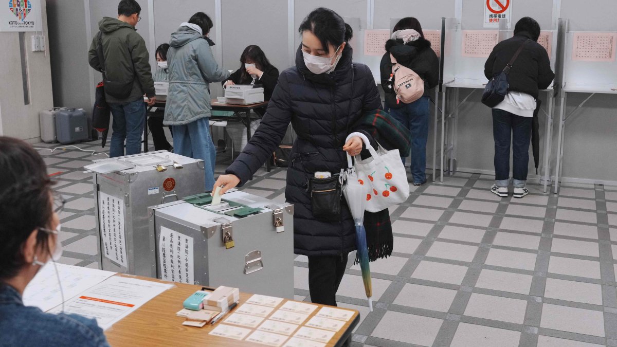 A voter casts their ballot in the House of Representatives election at a polling station in Tokyo, Japan, Feb. 8, 2026. (AFP Photo)