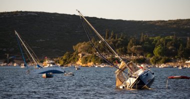 Sunken yachts are seen at Teos Marina after a tsunami triggered by a magnitude 7.0 earthquake in the Aegean Sea, Seferihisar, Izmir, Türkiye, Nov. 1, 2020. (Shutterstock)
