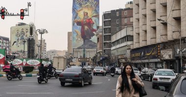 Traffic moves through a street in Tehran on Feb. 7, 2026. (AFP Photo)