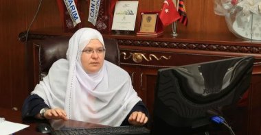 An undated photo shows Zeynep Akgün Güneş in her office in her traditional attire, Mihalgazi, Türkiye.  (AA Photo)