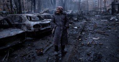 A resident stands at the site of apartment buildings hit by a Russian airstrike, in Kramatorsk in the Donetsk region, Ukraine, Feb. 8, 2026. (Reuters Photo)