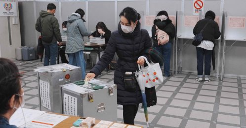 A voter casts their ballot in the House of Representatives election at a polling station in Tokyo, Japan, Feb. 8, 2026. (AFP Photo)