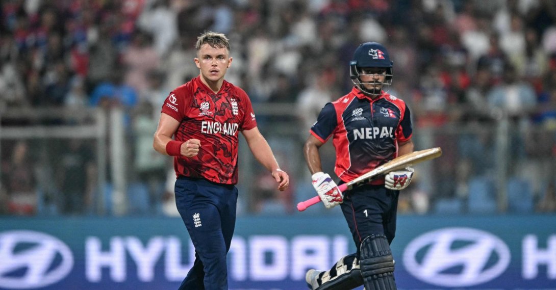 England's Sam Curran (L) reacts after his team's win as Nepal's Lokesh Bam looks on at the end of a 2026 ICC Men's T20 Cricket World Cup match, in Mumbai, India, Feb. 8, 2026. (AFP Photo)