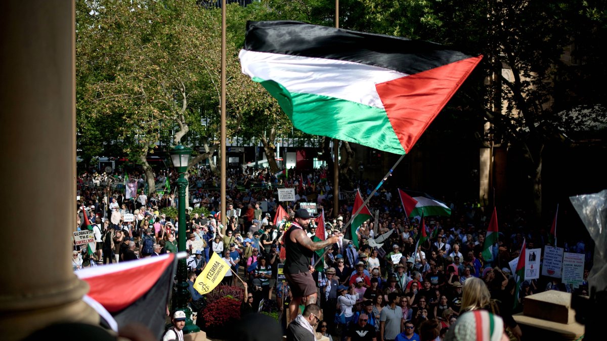Pro-Palestinian protesters rally outside Sydney Town Hall against Israeli president's visit to Australia, in Sydney, Australia, Feb. 9, 2026. (EPA Photo)