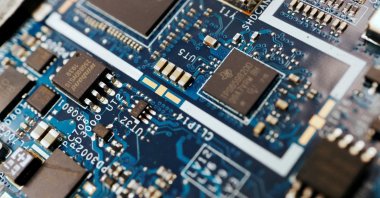 Semiconductor chips are seen on a circuit board of a computer in this illustration, Feb. 25, 2022. (Reuters Photo)