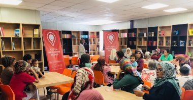Women engage in reading and learning activities at a KADEM library within a training center, Kahramanmaraş, Türkiye. (Courtesy of KADEM)