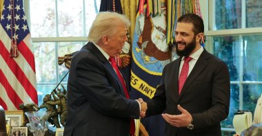 U.S. President Donald Trump (L) shakes hands with Syrian President Ahmad al-Sharaa, White House, Washington, U.S., Nov. 10, 2025. (AP Photo)
