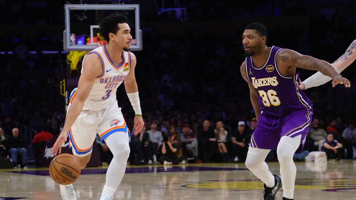 Oklahoma City Thunder guard Jared McCain (L) dribbles the ball as Los Angeles Lakers guard Marcus Smart defends during the second half at Crypto.com Arena, Los Angeles, U.S., Feb. 9, 2026. (AFP Photo)