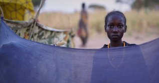 A woman from el-Fasher is seen at a displacement camp where residents sought refuge from fighting between the army and the RSF, in Tawila, Darfur region, Sudan, Oct. 29, 2025. (AP Photo)
