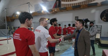 Turkish Gymnastics Federation President Suat Celen (R) visits the men’s artistic gymnastics national team training camp at the Murat Canbas Gymnastics Hall where athletes continue preparations for the 2026 cups and championships in the Karaçayır district, Bolu, Türkiye, Feb. 10, 2026. (AA Photo)