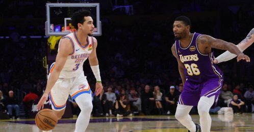 Oklahoma City Thunder guard Jared McCain (L) dribbles the ball as Los Angeles Lakers guard Marcus Smart defends during the second half at Crypto.com Arena, Los Angeles, U.S., Feb. 9, 2026. (AFP Photo)