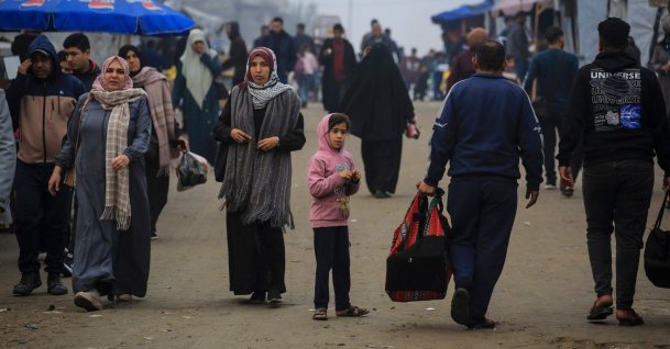 Palestinians walk down a road in Khan Younis, in the southern Gaza Strip, Palestine, Feb. 10, 2026. (AFP Photo)