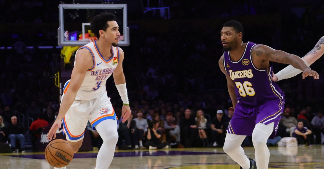 Oklahoma City Thunder guard Jared McCain (L) dribbles the ball as Los Angeles Lakers guard Marcus Smart defends during the second half at Crypto.com Arena, Los Angeles, U.S., Feb. 9, 2026. (AFP Photo)