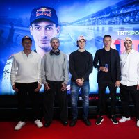 National rider Toprak Razgatlioglu (C) poses for a commemorative photo with fellow athletes ahead of the premiere of the documentary “El Turco: Toprak Razgatlioglu,” which chronicles his journey from World Superbike champion to MotoGP, at Terminal Kadikoy, Istanbul, Türkiye, Feb. 10, 2026. (AA Photo)