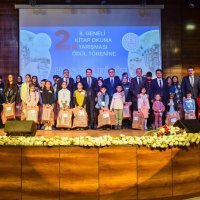 Governor Ozan Balcı poses with students and officials during a reading event, Van, eastern Türkiye, Feb. 11, 2026. (Courtesy of Van Governorate)