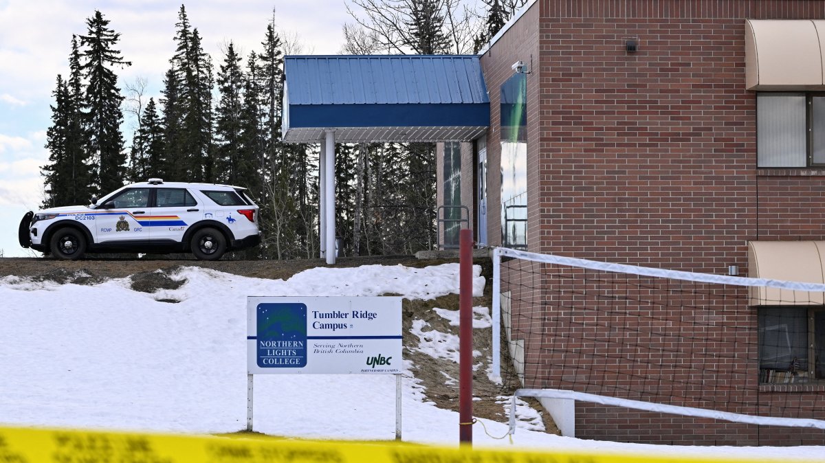 A police vehicle is parked outside a high school, the site of a deadly mass shooting in the town of Tumbler Ridge, British Columbia, Canada, Feb. 11, 2026. (Reuters Photo0