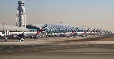 Emirates Airlines A330s, 777s and A380s line up at Terminal 3 of Dubai International Airport (DXB), Dubai, UAE, Jan. 21, 2016. (Shutterstock Photo)