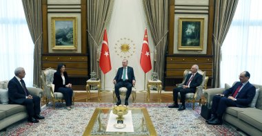 President Recep Tayyip Erdoğan, accompanied by intelligence chief Ibrahim Kalın (1st R) and AK Party acting Chair Efkan Ala (2nd R), hosts lawmakers Pervin Buldan (2nd L) and Mithat Sancar (1st L), Ankara, Türkiye, Feb. 11, 2026. (AA Photo)