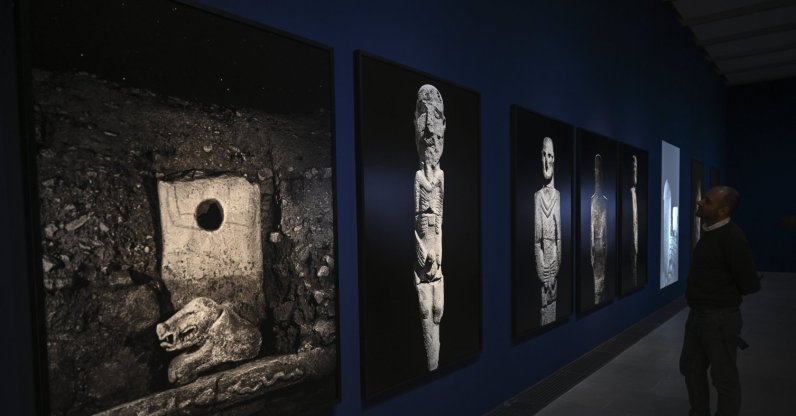 A visitor explores the “Building Community: Göbeklitepe, Taş Tepeler and Life 12,000 Years Ago” exhibition, Berlin, Germany, Feb. 5, 2026. (AA Photo)