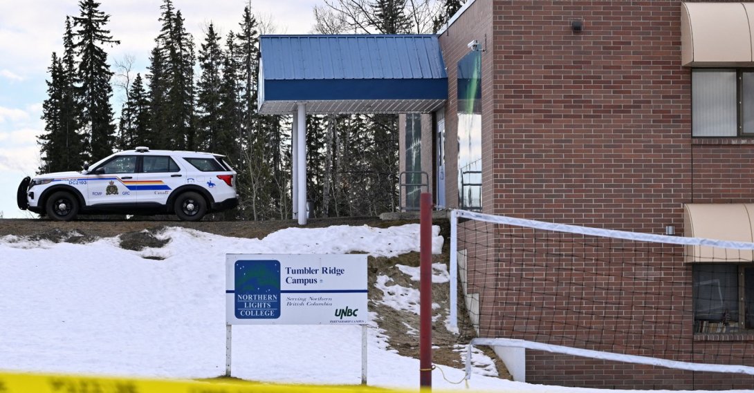 A police vehicle is parked outside a high school, the site of a deadly mass shooting in the town of Tumbler Ridge, British Columbia, Canada, Feb. 11, 2026. (Reuters Photo0
