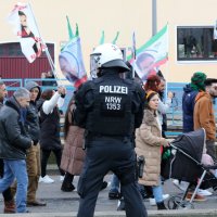 A police officer secures a demonstration of PKK terrorist sympathizers demanding the release of the PKK's imprisoned ringleader Abdullah Öcalan, Cologne, Germany, Feb. 17, 2024. (Reuters Photo)